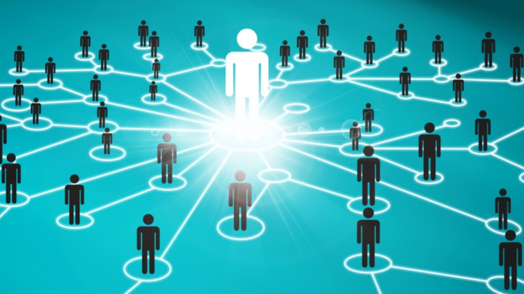 Valuation professional at the center of a connected network, symbolizing peer collaboration and knowledge sharing at the ISBA-NEBB 2025 Conference