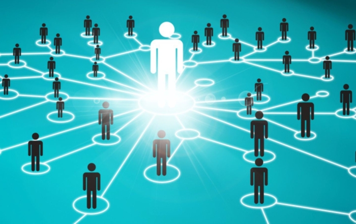 Valuation professional at the center of a connected network, symbolizing peer collaboration and knowledge sharing at the ISBA-NEBB 2025 Conference