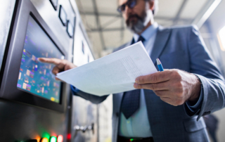 Professional doing data gathering for equipment appraisal reports